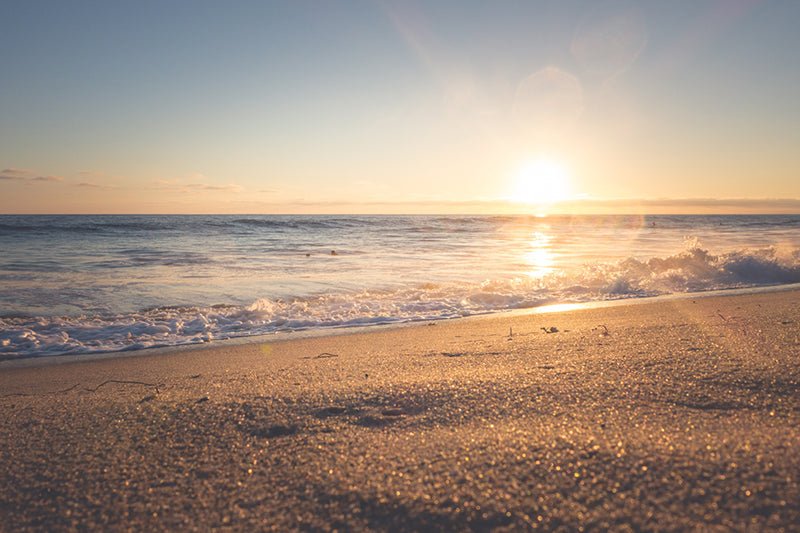 Plage au coucher de soleil